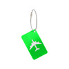 A green luggage tag featuring a silver airplane design, attached with a metal wire loop.