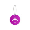 A purple round luggage tag featuring an airplane design and a metal wire attachment.