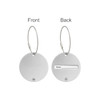 A round silver wire cable luggage tag with a smooth front and a back featuring a name slot.
