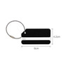 A square brushed aluminium luggage tag in black, featuring a wire loop and white areas for personal information.