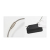 A square aluminium luggage tag in black, attached with a silver wire cable, featuring address fields.