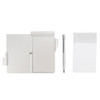 An aluminium pocket notebook in silver, featuring a pen and a notepad, with a minimalist design.