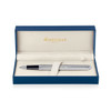 A brushed stainless rollerball pen in a blue gift box with a soft interior and a logo.