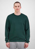A green men's everyday crew sweatshirt displayed on a model, featured with a plain design and a logo.