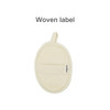 A natural, oval-shaped loofah exfoliating shower sponge in cream colour with a woven label.