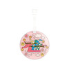 Acrylic luggage tag in pink with a whimsical design featuring a jester hat and smiley faces, complete with a strap.