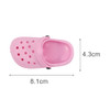 A pair of pink pet clog slides with ventilation holes, featuring a simple design and measurements for size.