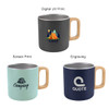 A travel mug set featuring three designs: grey, mint green, and navy, each with a wooden handle.