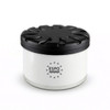 A round air freshener container with a black lid and a white body. It has a logo on the front.