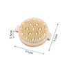 An exfoliating brush with soft massage nodules, featuring a round design in natural tones, measuring 11 cm in diameter.
