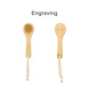 A natural wooden face brush with a bristle head and a wooden handle, featuring a rope tie.