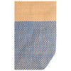 A textured tote bag featuring light brown and blue hues, with a woven pattern and a branded logo.