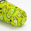 A drink bottle sleeve in vibrant green with a lime pattern, featuring a logo. Suitable for medium-sized bottles.