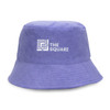 A purple reversible twill/terry bucket hat featuring a logo on the front.