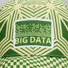 A cap featuring a green and yellow geometric pattern with a patch. The cap has a logo on the front.