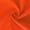 A close-up of bright orange fabric showing a smooth texture, suitable for safety vests.