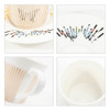A ceramic coffee mug with a dynamic mirror reflection design, featuring a white and orange striped pattern.