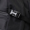 A close-up of a black backpack strap featuring a plastic buckle and stitched detailing.