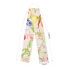 A long scarf featuring a twill weave with a floral design in various colours, measuring 145cm by 12cm.
