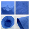 A blue dual-material reversible bucket hat with textured and smooth fabric sections, featuring a logo.