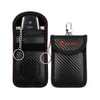 A black carbon fibre key pouch with red stitching, featuring a clip and keyring attachment, and a branded logo.