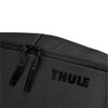 A black toiletry bag with a textured surface, featuring a zip closure and a logo.