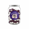 A clear jar filled with purple and white jelly beans. The jar features a colourful label with a logo.