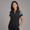 A black polo shirt with grey accents, featuring a collared neckline and short sleeves, worn by a smiling woman.