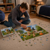 A boy assembling a colourful jigsaw puzzle featuring a dog in a vibrant outdoor scene, with a gift box beside him.