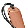 A tan leather luggage tag with a dark string, featuring a slot for identification.