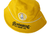 A yellow terry bucket hat with a white trim and a logo on the front.