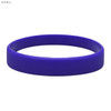 A dark blue silicone wristband with an embossed design, featuring a smooth texture and a round shape.