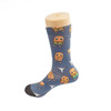 Colourful sock design featuring cartoon characters, predominantly in blue with orange, green, and yellow accents.