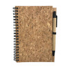 A cork notebook with a black spiral binding and a brown pen attached.