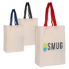 Three Calico trade show bags in natural, with red, black, and navy handles, featuring a logo on one bag.