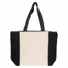 A large tote bag featuring a cream centre and black sides, with two sturdy shoulder straps and a zip closure.