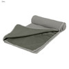 A grey cooling towel, featuring a textured surface and rolled at one end, displayed flat with a contrasting inner colour.