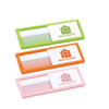 A set of three combs in green, orange, and pink, each with a white casing featuring a logo.