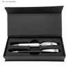 A sleek black packaging featuring two writing instruments in silver and chrome finishes. Includes a logo.