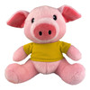 A pink pig plush toy wearing a yellow T-shirt, featuring large ears and a cute face.