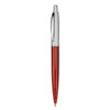 A plastic pen with a red barrel and silver accents, featuring a clip and a ballpoint tip.