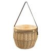 A round wicker picnic cooler basket with a wooden lid and a shoulder strap, showcasing natural tones.