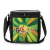 A black lunch cooler bag with vibrant green and orange graphics, featuring a logo on the front and a shoulder strap.