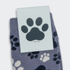 A pair of knitted kids' socks in a purple-grey colour featuring a playful paw print design. Packaging has a paw badge.