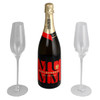 A champagne bottle with two clear flutes, featuring red and gold branding, in a sleek presentation.