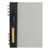 A recycled journal book in grey with a black spiral binding and a pen attached. It features branding on the cover.