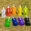 A drink bottle collection featuring various colours: clear, orange, yellow, green, purple, and black, each with a logo.