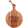 A round wooden cheeseboard with a handle, featuring a logo and a natural finish.