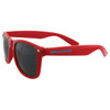 Red sunglasses with dark lenses, featuring a blue logo on the side. Suitable for leisure and outdoor activities.