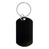 A black dog tag keychain with a metal ring for attachment. The keychain has a smooth, blank surface.